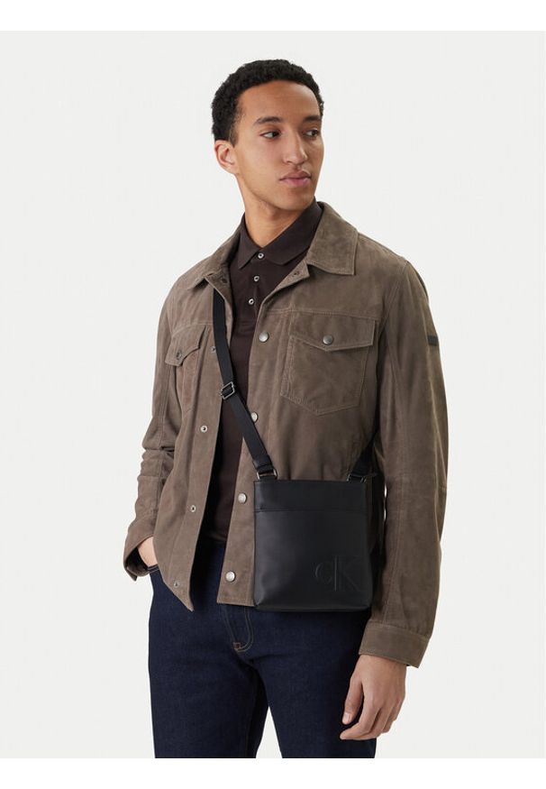 Calvin Klein Saszetka Bold Ck Flatpack LV04D3344G Czarny. Kolor: czarny. Materiał: skóra