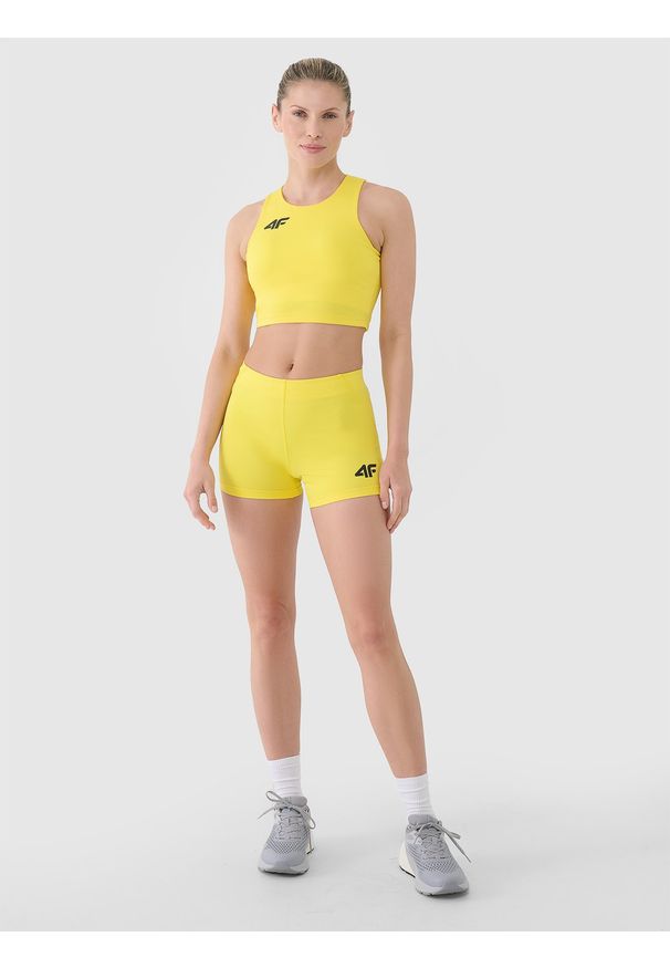 4f - 4F Legginsy krótkie treningowe damskie - żółte XL. Kolor: żółty. Materiał: dzianina, elastan, włókno, syntetyk, materiał. Długość: krótkie. Wzór: gładki, jednolity, ze splotem. Sport: fitness