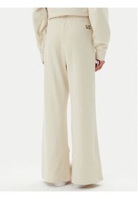 EA7 Emporio Armani Spodnie dresowe 7W000106 AF12473 U1079 Beżowy Loose Fit. Kolor: beżowy. Materiał: bawełna