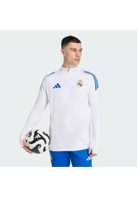 Adidas - Koszulka treningowa Real Madryt Tiro 25 Competition. Kolor: biały. Materiał: dresówka. Sport: piłka nożna