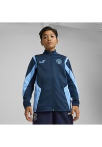 Puma - Młodzieżowa kurtka Manchester City ftblNRGY+ PUMA Marine Blue Blazing. Kolor: niebieski. Wzór: aplikacja