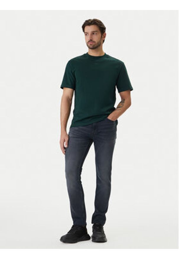 Hugo - HUGO Jeansy 50556055 Granatowy Extra Slim Fit. Kolor: niebieski