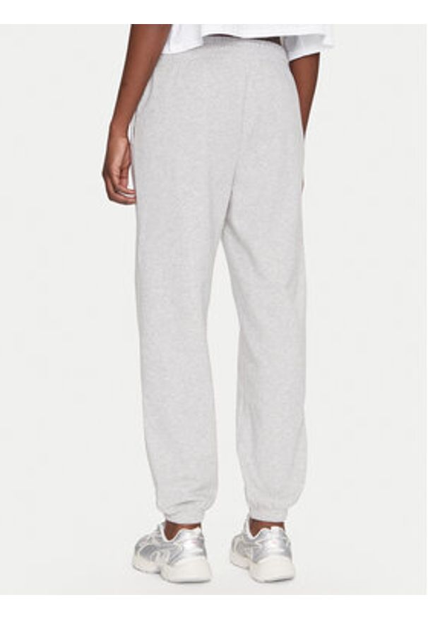 Under Armour Spodnie dresowe Ua Rival 1382735 Szary Loose Fit. Kolor: szary. Materiał: bawełna