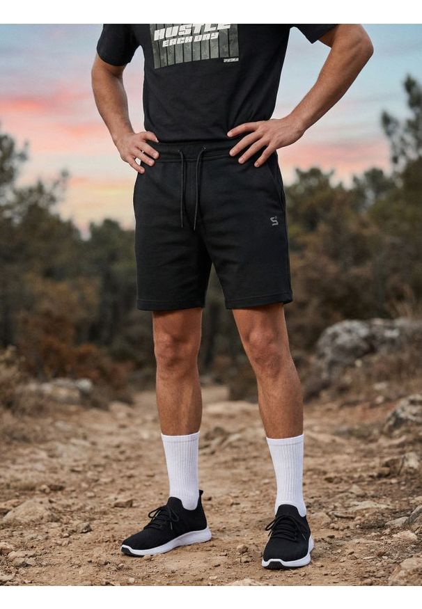 Sinsay - Bawełniane szorty SNSY PERFORMANCE - czarny. Kolor: czarny. Materiał: bawełna