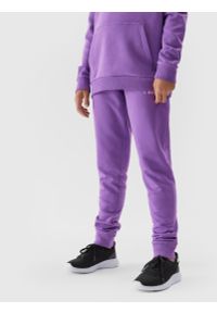 4F JUNIOR - Spodnie dresowe joggery dziewczęce. Kolor: fioletowy. Materiał: dresówka. Długość: długie
