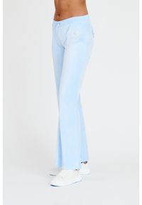 Juicy Couture - JUICY COUTURE Błękitne spodnie Heritage Dog Crest Kaisa Trackpant. Kolor: niebieski. Materiał: dresówka #5