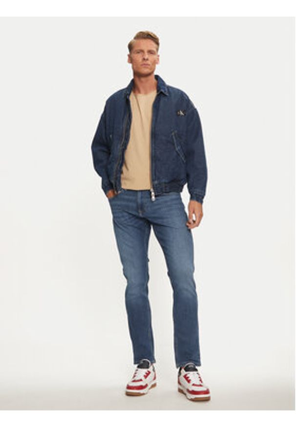 Tommy Jeans Jeansy Scanton DM0DM21052 Granatowy Slim Fit. Kolor: niebieski