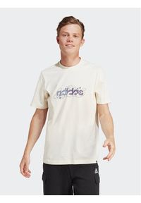 Adidas - adidas T-Shirt Illustrated Linear IM8310 Écru Regular Fit. Materiał: bawełna #1