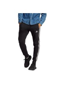 Adidas - Spodnie męskie adidas Essentials French Terry Tapered Cuff 3-Stripes. Kolor: wielokolorowy, biały, czarny, szary. Materiał: bawełna, materiał. Sport: joga i pilates, fitness