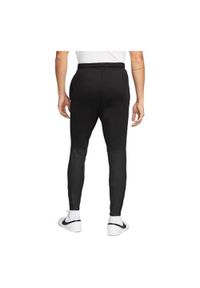 Spodnie treningowe męskie Nike Thermafit Strike Winter Warrior. Kolor: wielokolorowy. Materiał: dresówka. Sport: turystyka piesza