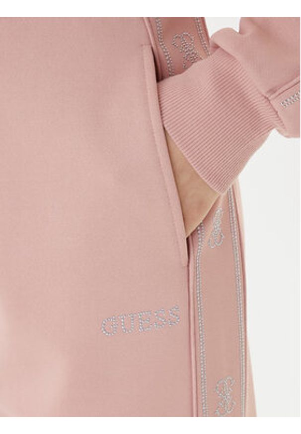 Guess Spodnie dresowe V5BB23 KCX22 Różowy Regular Fit. Kolor: różowy. Materiał: syntetyk