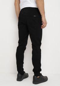 Born2be - Czarne Jeansy Joggery ze Ściągaczami i Sznurkiem w Pasie Winara. Okazja: na co dzień. Kolor: czarny. Styl: casual #7
