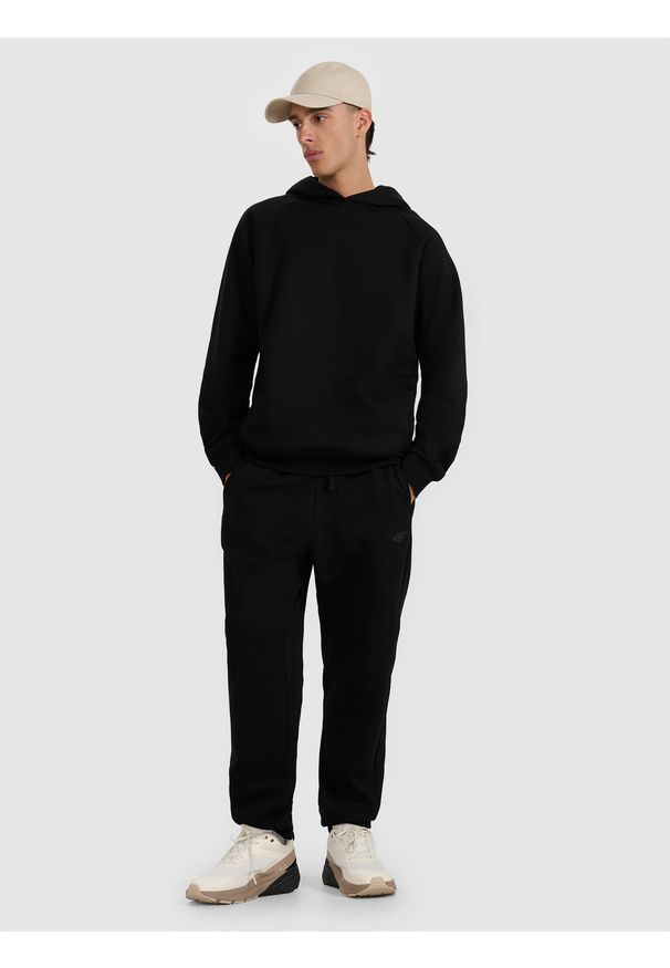 4f - 4F Bluza dresowa nierozpinana z kapturem męska - czarna XXL. Okazja: na co dzień. Typ kołnierza: kaptur. Kolor: czarny. Materiał: dresówka. Długość rękawa: raglanowy rękaw. Styl: casual, sportowy