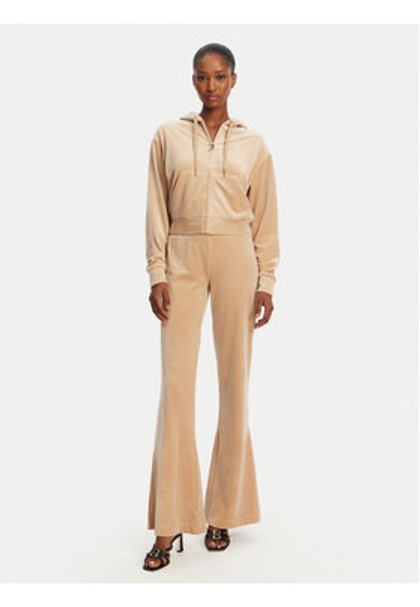 Juicy Couture Spodnie dresowe Christine JCWBJ125304 Beżowy Flared Leg. Kolor: beżowy. Materiał: syntetyk