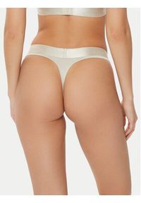 Calvin Klein Underwear Stringi 000QF7997E Beżowy. Kolor: beżowy. Materiał: bawełna