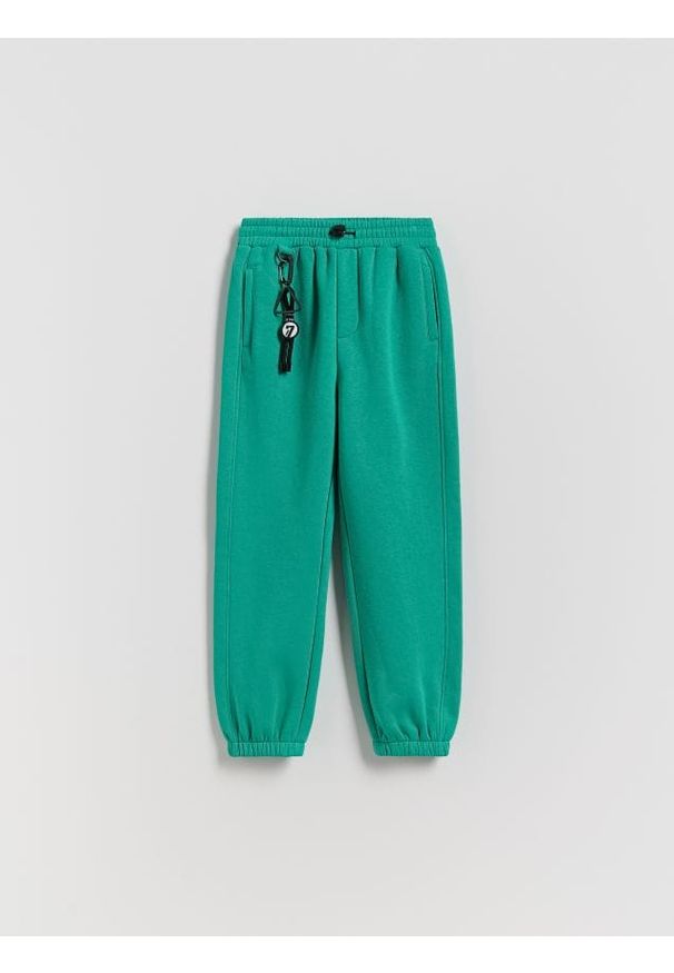 Reserved - Bawełniane spodnie jogger - miętowy. Kolor: miętowy. Materiał: bawełna. Wzór: gładki