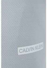 Calvin Klein Performance Spodnie męskie kolor szary gładkie. Kolor: szary. Materiał: dzianina. Wzór: gładki