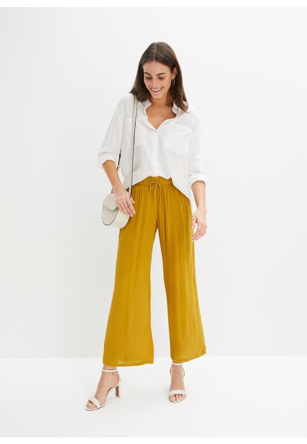 bonprix - Spodnie z gumką w talii, z wiskozy. Kolor: żółty. Materiał: wiskoza
