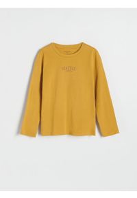 Reserved - Koszulka longsleeve z nadrukiem - brązowy. Kolor: brązowy. Materiał: bawełna, dzianina. Długość rękawa: długi rękaw. Wzór: nadruk