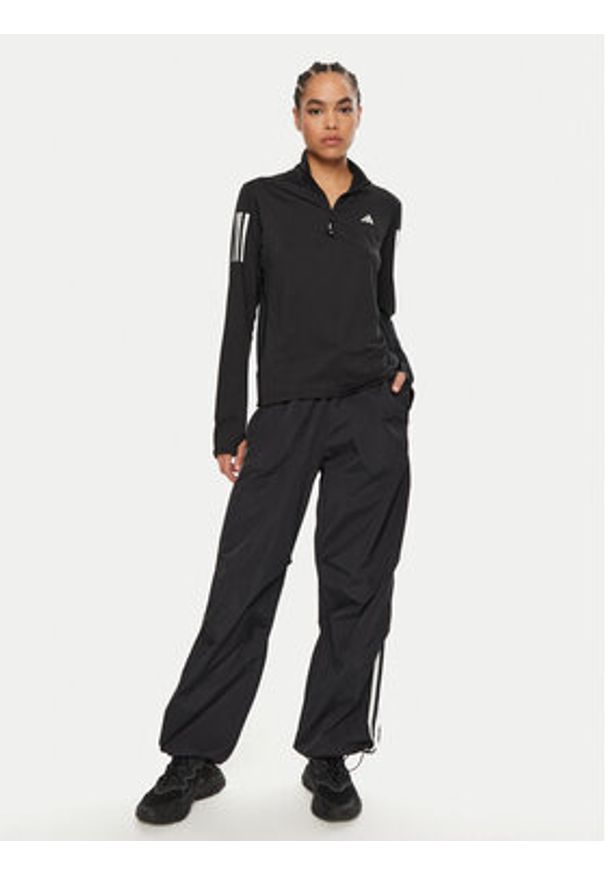 Adidas - adidas Bluza techniczna Own the Run IK7440 Czarny Regular Fit. Kolor: czarny. Materiał: syntetyk. Sport: bieganie