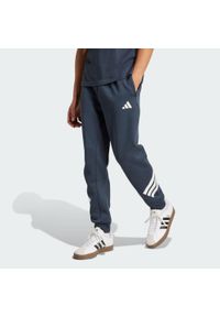 Adidas - Spodnie Future Icons z 3 paskami. Kolor: fioletowy. Materiał: materiał. Sport: fitness #1