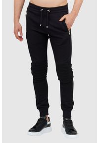 Balmain - BALMAIN Dresowe spodnie męskie z wypukłym logo. Kolor: czarny. Materiał: bawełna #1