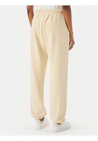 TOMMY HILFIGER - Tommy Hilfiger Spodnie dresowe Logo Embroidery WW0WW49706 Beżowy jasny Regular Fit. Kolor: beżowy. Materiał: bawełna #2