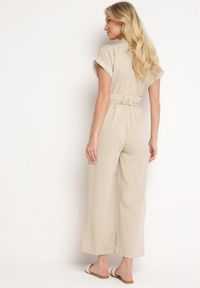 Born2be - Beżowy Kombinezon z Krótkim Rękawem i Szerokimi Nogawkami z Materiałowym Paskiem Floeria. Okazja: na co dzień. Kolor: beżowy. Materiał: materiał. Długość rękawa: krótki rękaw. Długość: krótkie. Styl: elegancki, casual, wizytowy #6