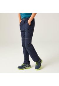 Regatta - Spodnie z odpinanymi nogawkami dziecięce Jnr Highton Z/O. Kolor: niebieski. Materiał: materiał. Sezon: lato. Sport: turystyka piesza #1