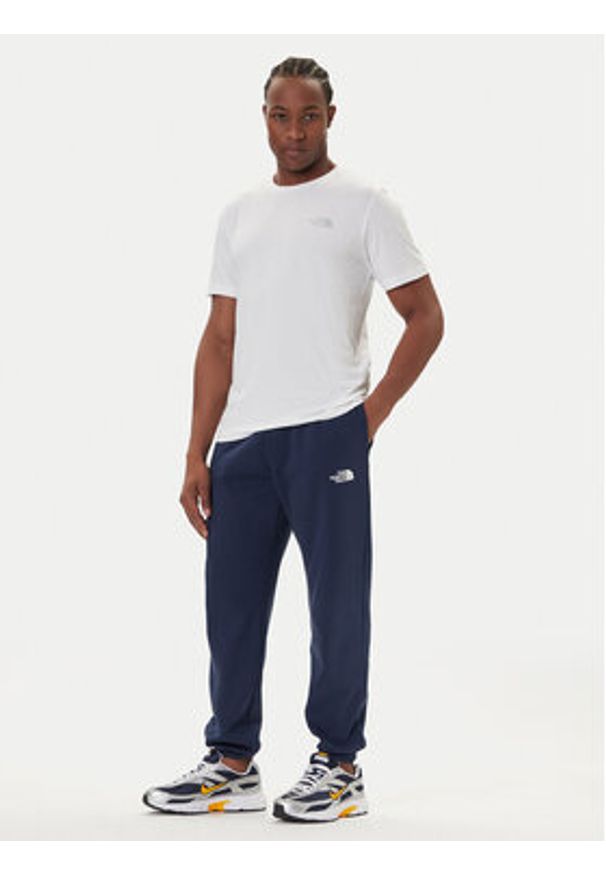 The North Face Spodnie dresowe Simple Dome NF0A8C1W Granatowy Regular Fit. Kolor: niebieski. Materiał: syntetyk, bawełna