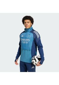 Adidas - Bluza Arsenal Tiro 25 Competition Winterized Top. Kolor: niebieski. Materiał: dresówka. Sport: fitness, piłka nożna #1