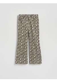 Reserved - Jeansy w zwierzęcy wzór - wielobarwny. Wzór: motyw zwierzęcy #1