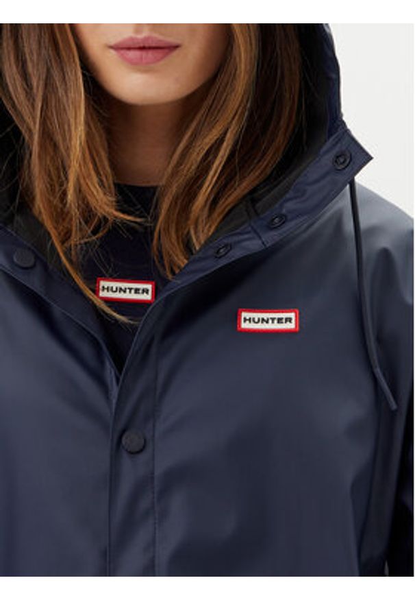 Hunter Kurtka przeciwdeszczowa Izzy Unisex HARU0012251 Granatowy Regular Fit. Kolor: niebieski. Materiał: syntetyk