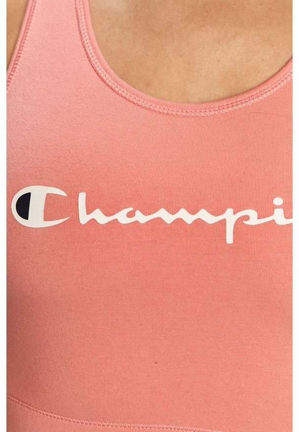 Champion - Biustonosz sportowy. Kolor: różowy. Wzór: nadruk