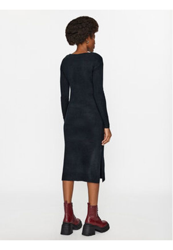 Vero Moda Sukienka dzianinowa 10291689 Czarny Relaxed Fit. Kolor: czarny. Materiał: syntetyk