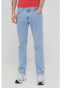 Tommy Jeans jeansy RYAN BF6132 męskie. Kolor: niebieski