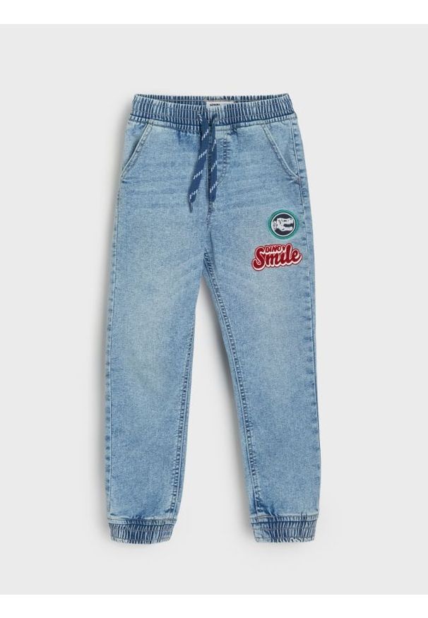 Sinsay - Jeansy jogger z efektem sprania - niebieski. Kolor: niebieski