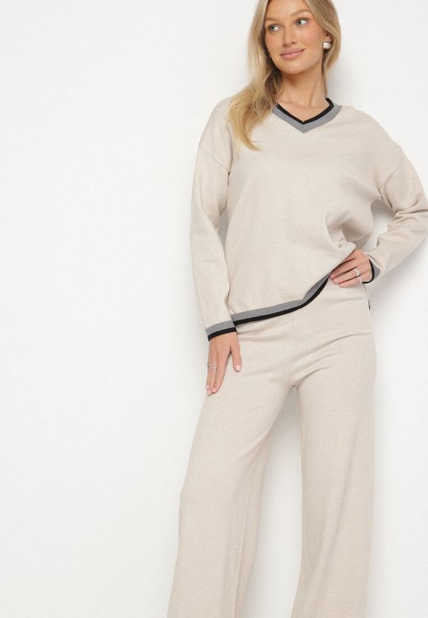 Born2be - Jasnobeżowy Dzianinowy Komplet z Ozdobną Lamówką Sweter i Szerokie Spodnie Ralenae. Kolor: beżowy. Materiał: dzianina