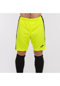 Spodenki do piłki nożnej męskie Joma Maxi. Kolor: czarny, zielony, wielokolorowy, żółty. Materiał: poliester. Sport: piłka nożna