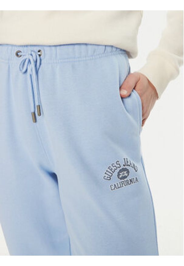 Guess Jeans Spodnie dresowe W5RB63 K68I4 Niebieski Regular Fit. Kolor: niebieski. Materiał: bawełna