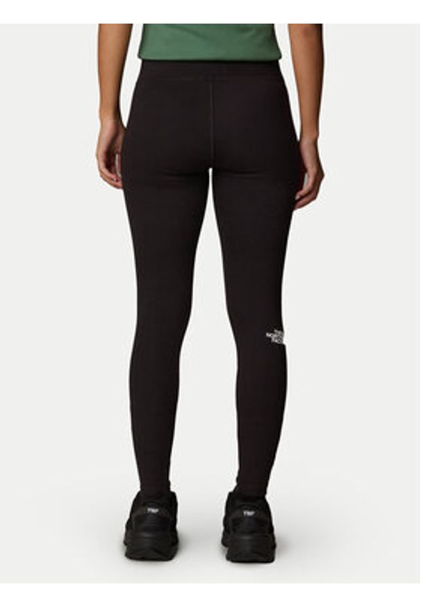 The North Face Legginsy Simple Dome NF0A8C1X Czarny Slim Fit. Kolor: czarny. Materiał: bawełna