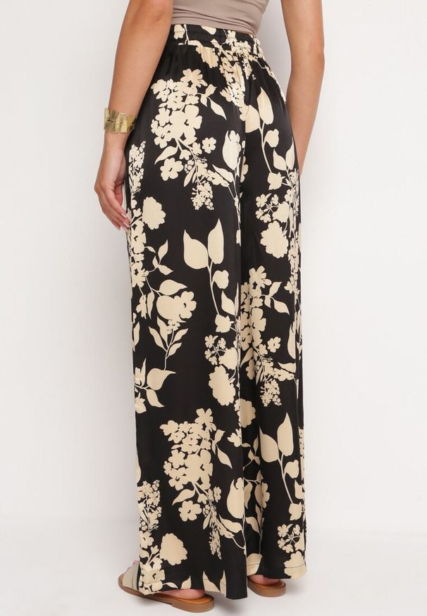 Born2be - Czarno-Beżowe Spodnie z Szerokimi Nogawkami i Gumką w Talii z Wysokim Stanem Dimete. Okazja: na co dzień. Stan: podwyższony. Kolor: czarny. Styl: casual, elegancki, klasyczny