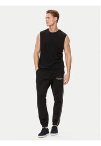 TOMMY HILFIGER - Tommy Hilfiger Spodnie dresowe Monotype MW0MW33701 Czarny Regular Fit. Kolor: czarny. Materiał: bawełna #2