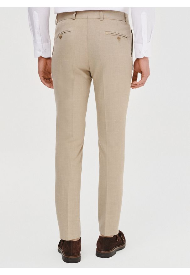 Pako Lorente - PAKO LORENTE – Beżowe spodnie ganiturowe. Kolor: beżowy. Materiał: poliester, elastan, wiskoza. Wzór: gładki. Styl: elegancki, młodzieżowy
