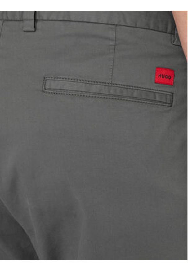 Hugo - HUGO Chinosy David251D 50530886 Szary ciemny Slim Fit. Kolor: szary. Materiał: bawełna