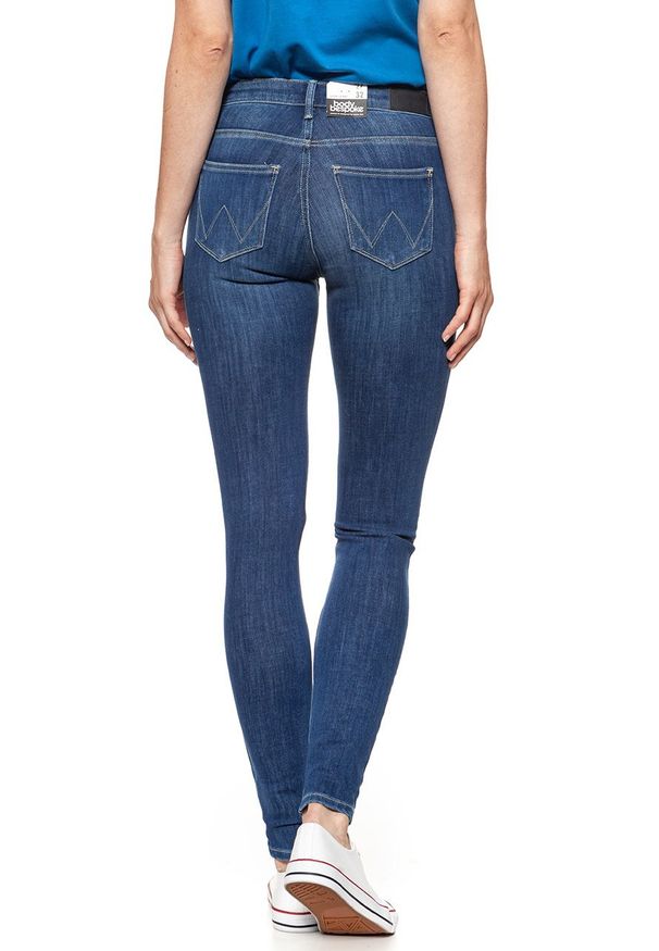 Wrangler - WRANGLER SUPER SKINNY SUMMER SKY W29JGT12W 112128559. Długość: długie. Wzór: aplikacja, ażurowy. Sezon: lato. Styl: sportowy, klasyczny