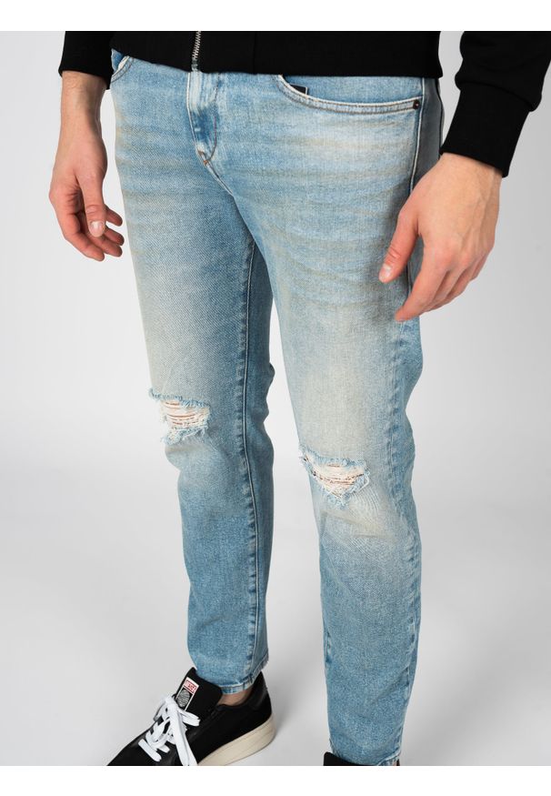 Diesel Jeansy "D-Strukt" | A12026-R07P3 | Mężczyzna | Niebieski. Okazja: na co dzień. Kolor: niebieski. Długość: długie. Styl: elegancki, casual