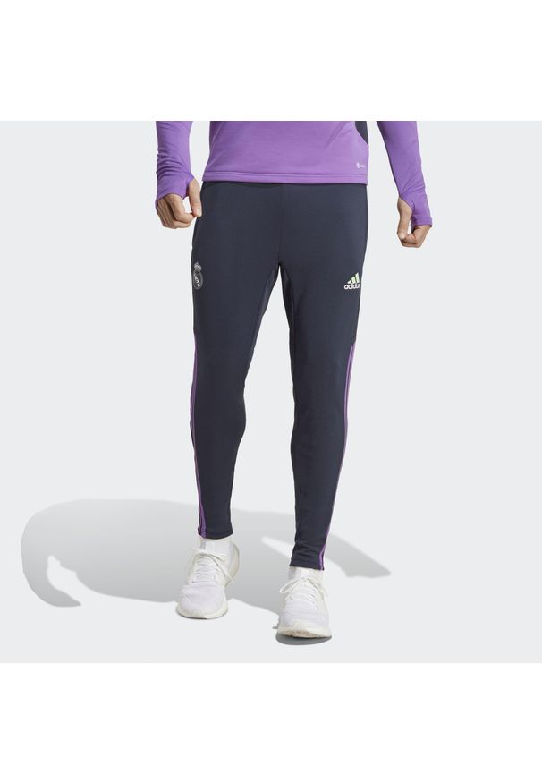 Spodnie do piłki nożnej męskie Adidas Real Madrid Condivo 22 Training Pants. Kolor: niebieski. Materiał: dresówka, materiał