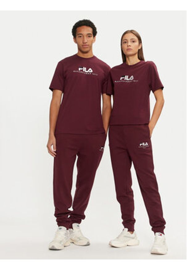 Fila Spodnie dresowe Unisex Bovrup FAU0146 Bordowy Regular Fit. Kolor: czerwony. Materiał: bawełna