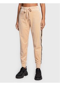DKNY Spodnie dresowe P2MF7OIY Beżowy Regular Fit. Kolor: beżowy. Materiał: syntetyk #1